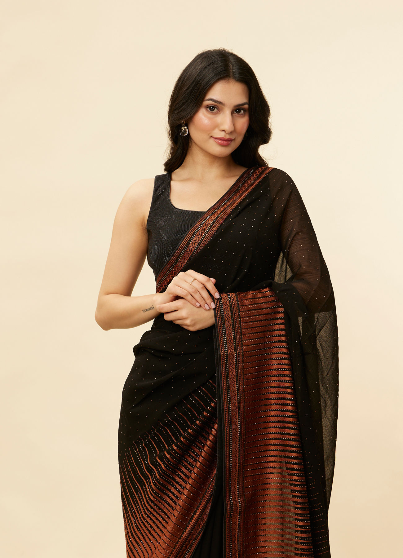 Mohey Women Kohl Black and Copper Stone Work Saree