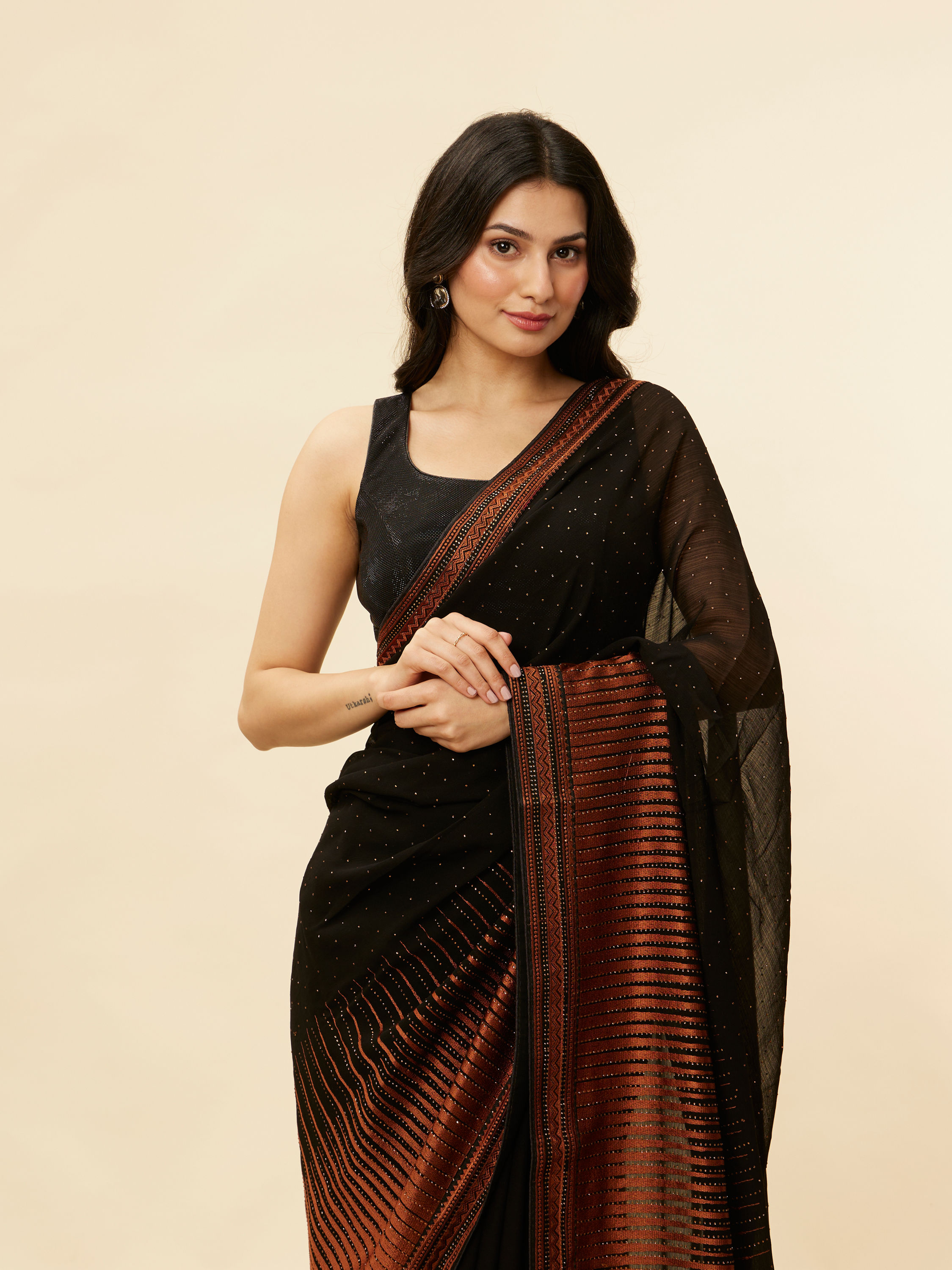 Mohey Women Kohl Black and Copper Stone Work Saree