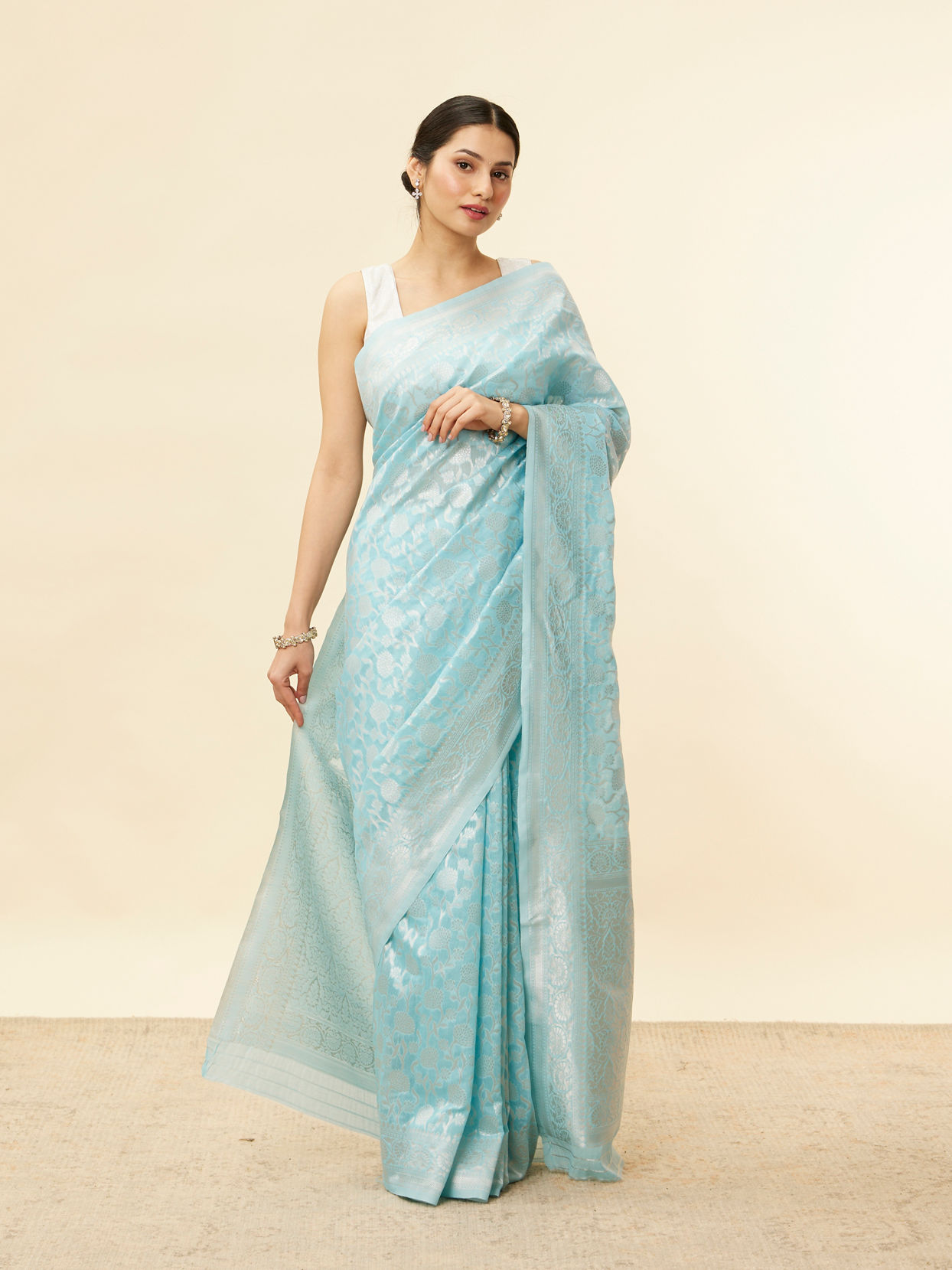 alt message - Mohey Women Sky Blue Floral Zari Work Saree image number 0