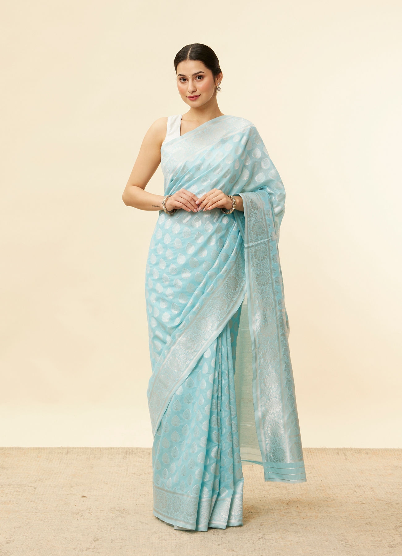 Mohey Women Aquamarine Blue Leaf Patterned Zari Work Saree