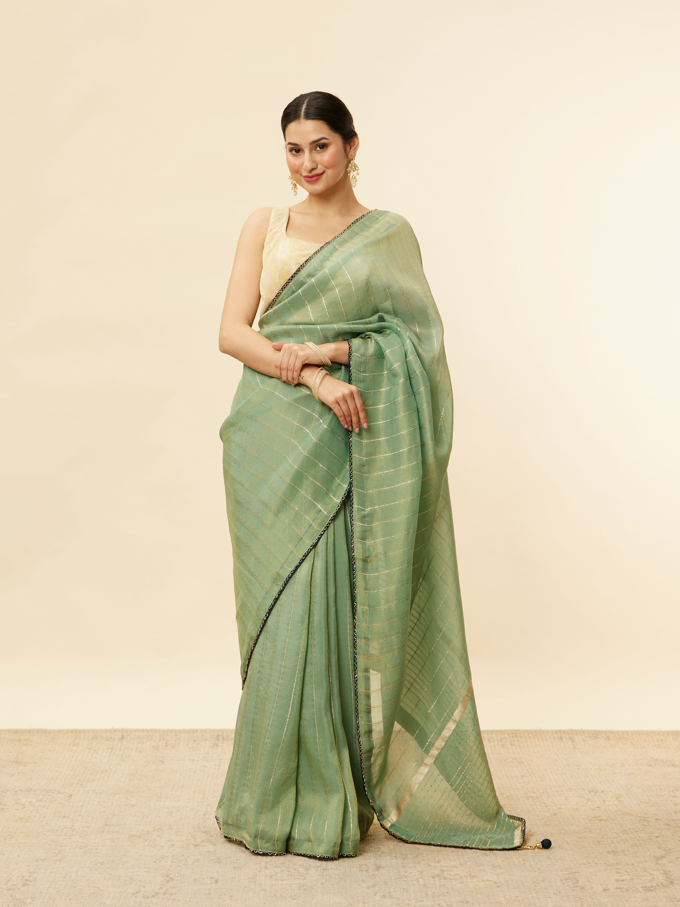 Mohey Women Forest Green Zari Striped Saree
