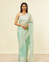 alt message - Mohey Women Light Blue Stone Embellished Saree image number 0