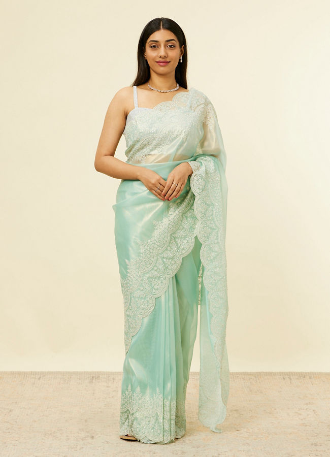 alt message - Mohey Women Light Blue Stone Embellished Saree image number 0