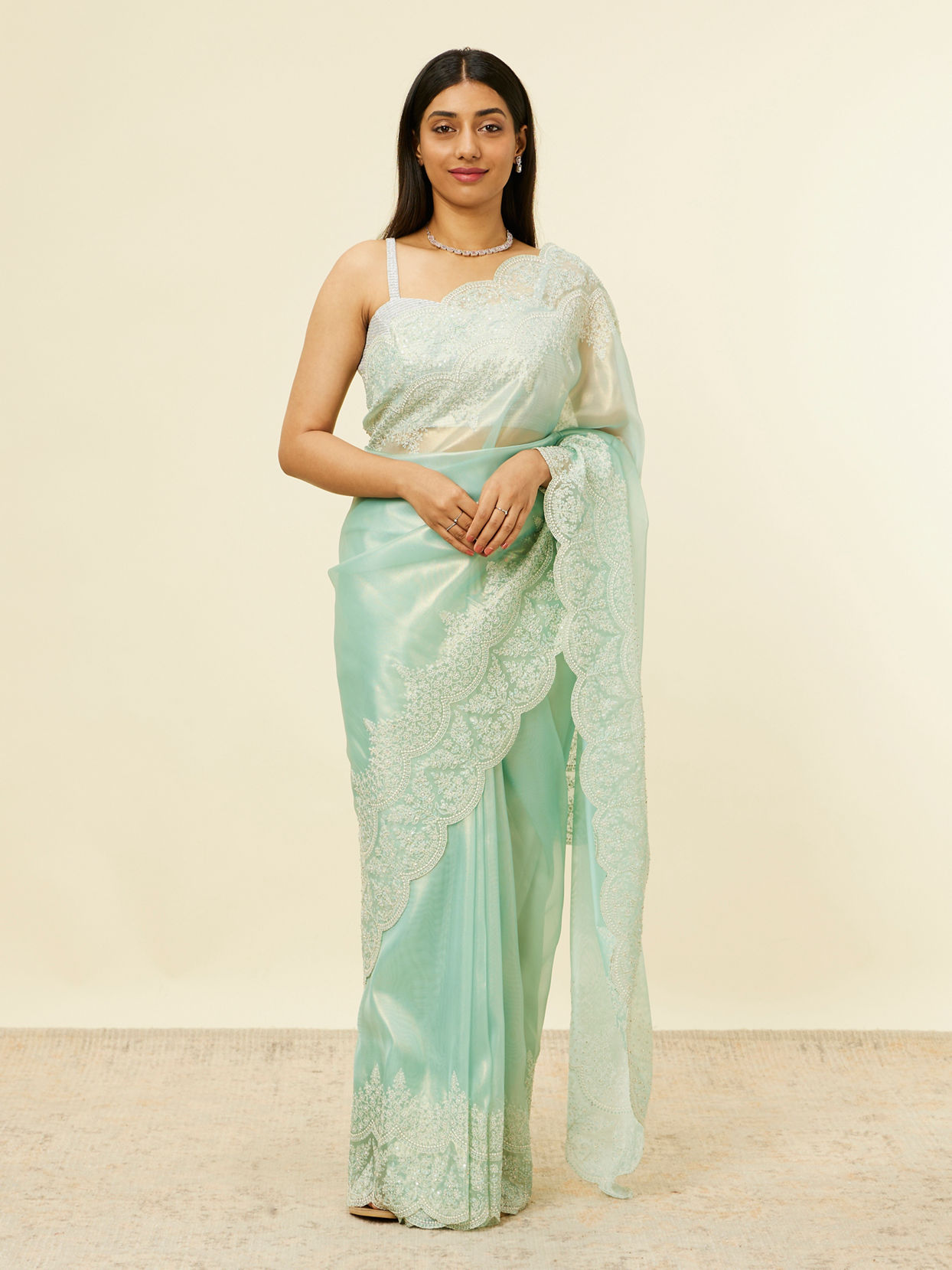 alt message - Mohey Women Light Blue Stone Embellished Saree image number 0