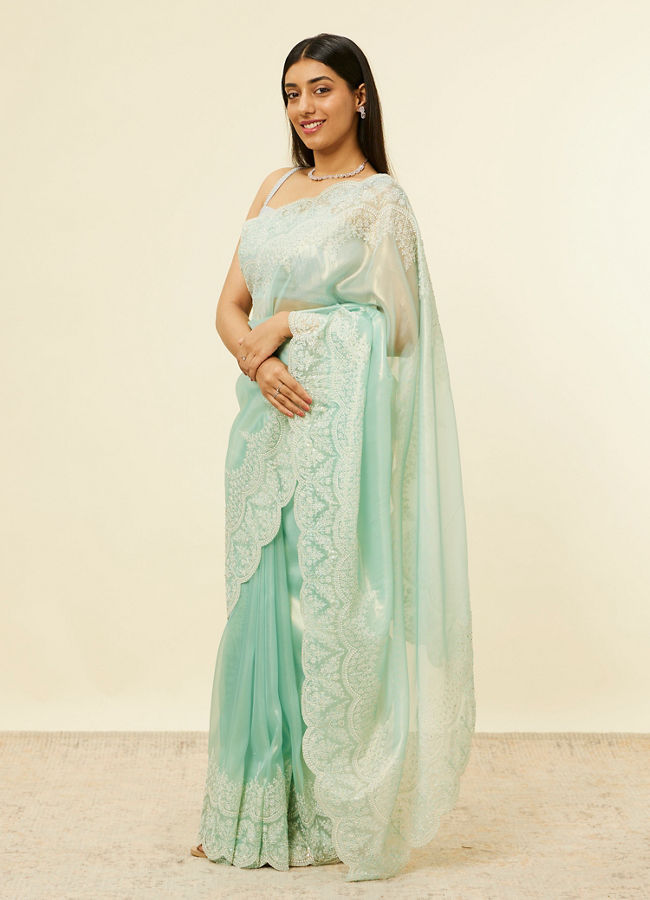 alt message - Mohey Women Light Blue Stone Embellished Saree image number 3