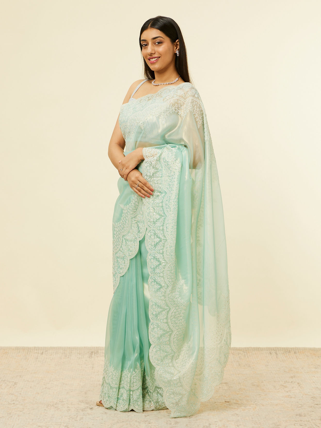 alt message - Mohey Women Light Blue Stone Embellished Saree image number 3