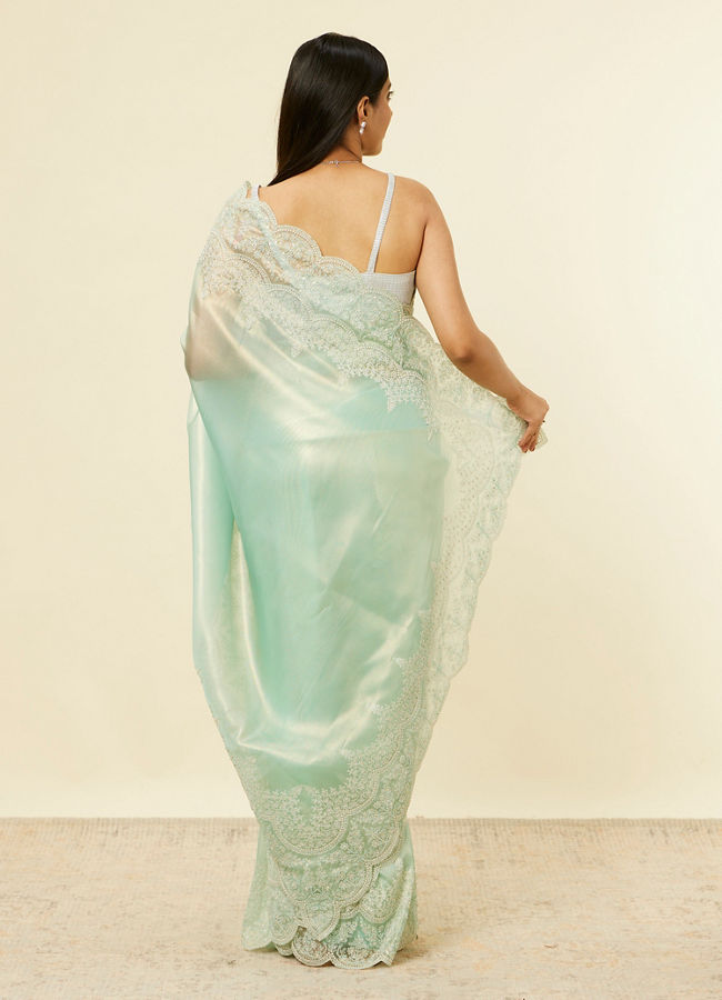 alt message - Mohey Women Light Blue Stone Embellished Saree image number 2