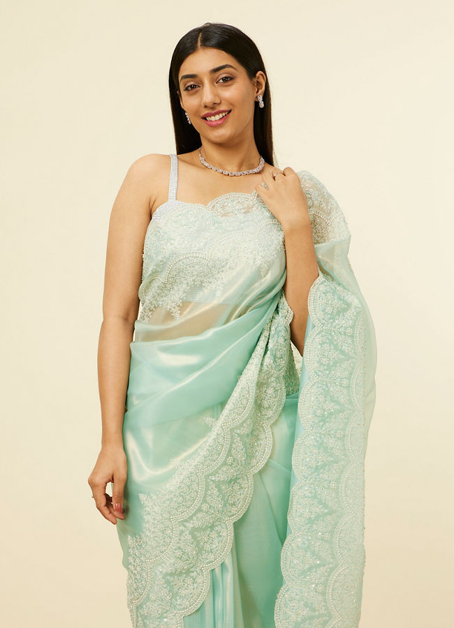 alt message - Mohey Women Light Blue Stone Embellished Saree image number 1