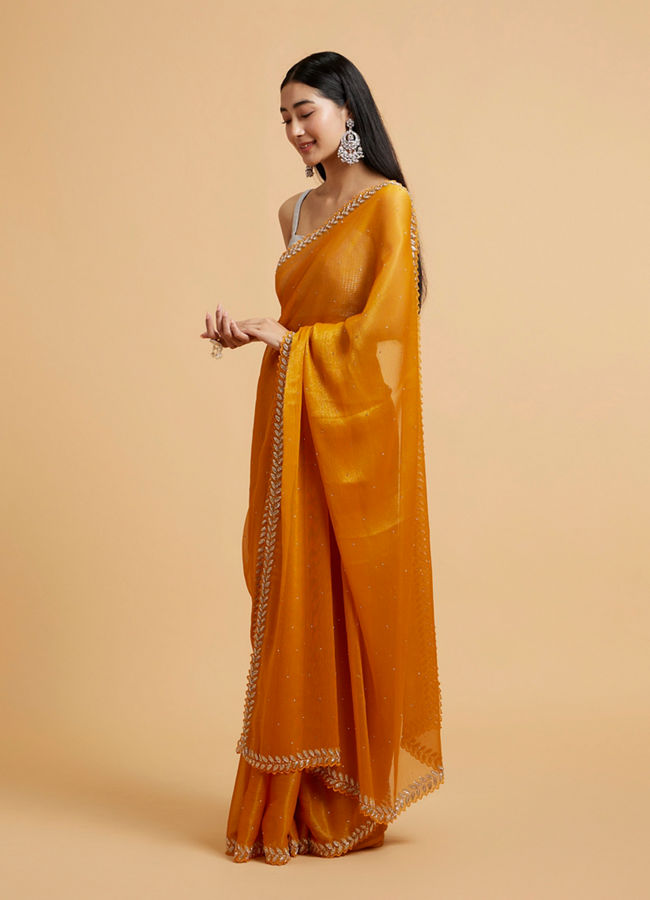 Mohey Women Mustard Yellow Saree with Leaf Patterned Border & Rhinestone Work