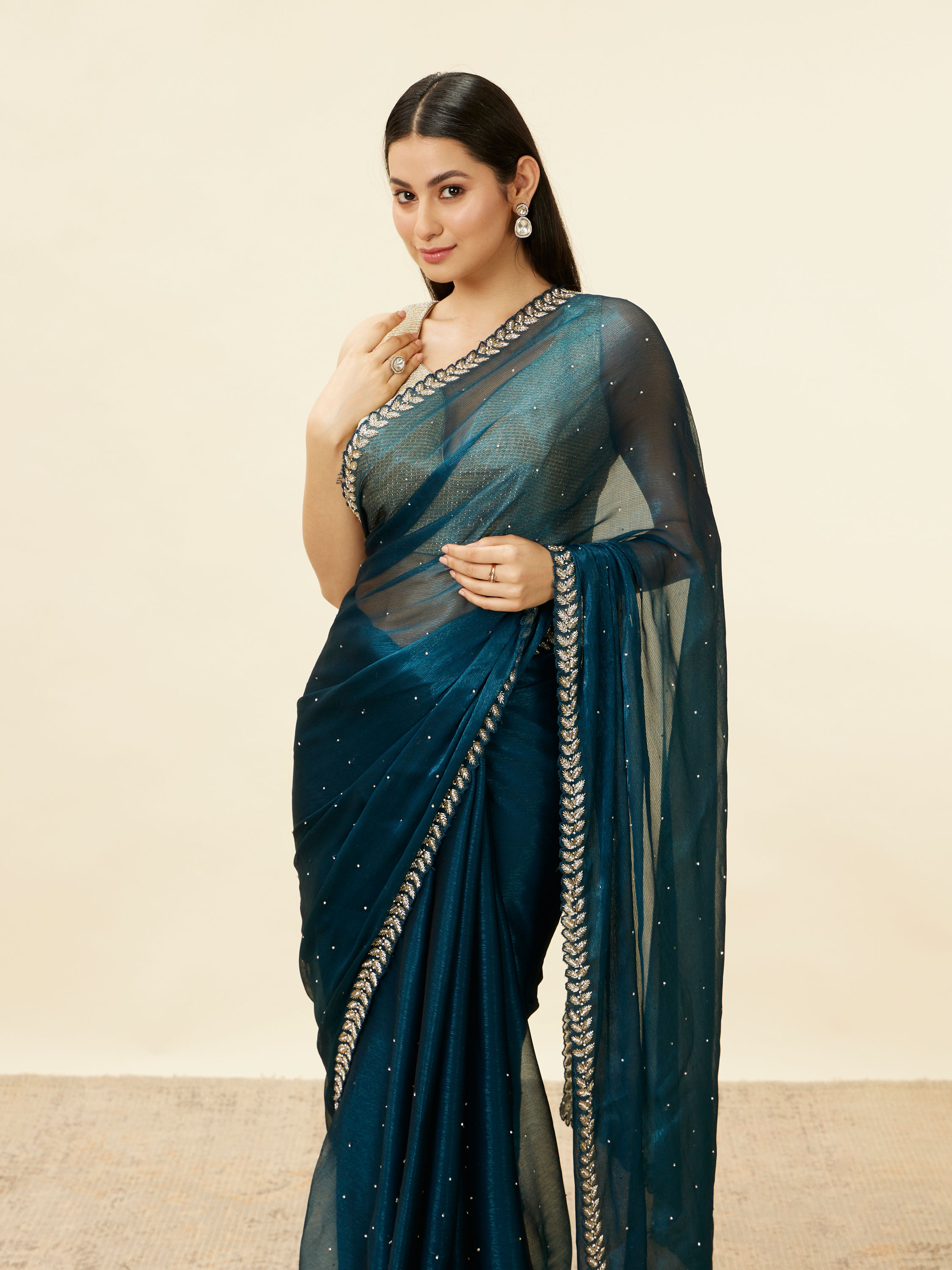 Mohey Women Peacock Blue Stone Embellished Saree