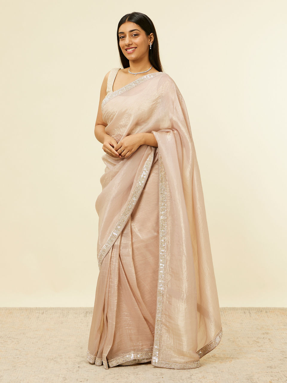Mohey Women Fawn Stone Embellished Border Saree