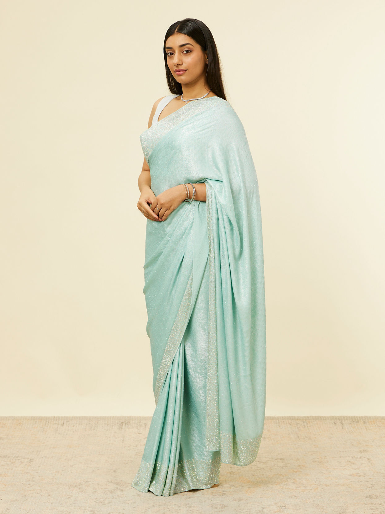 alt message - Mohey Women Light Blue Stone Embellished Saree image number 3