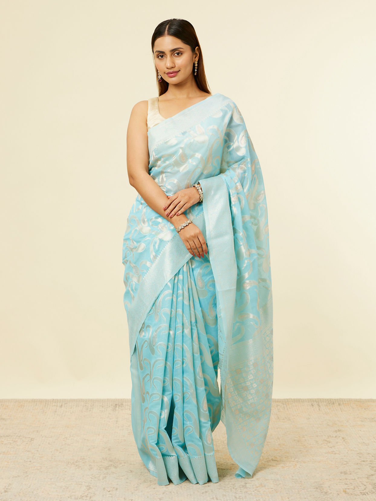 alt message - Mohey Women Light Blue Floral Zari Work Saree image number 0