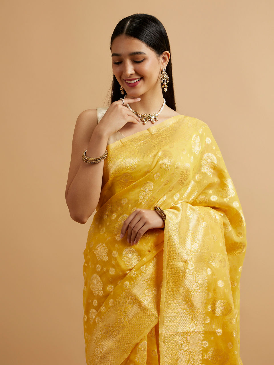 Mohey Women Radiant Yellow Zari Weave Saree