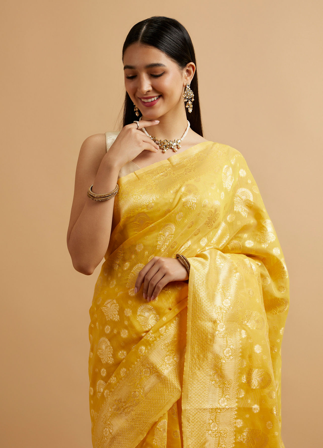 Mohey Women Radiant Yellow Zari Weave Saree