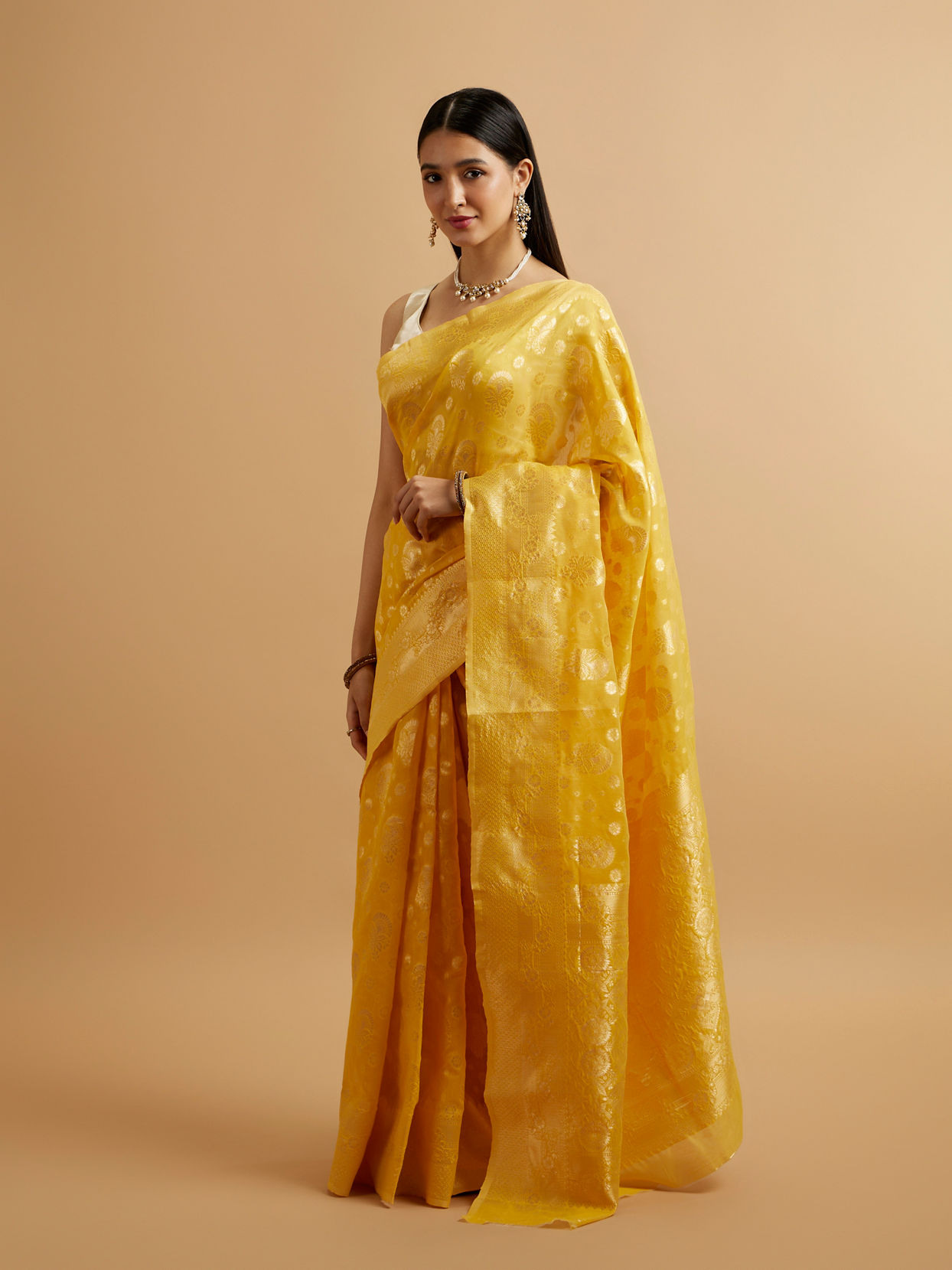 Mohey Women Radiant Yellow Zari Weave Saree