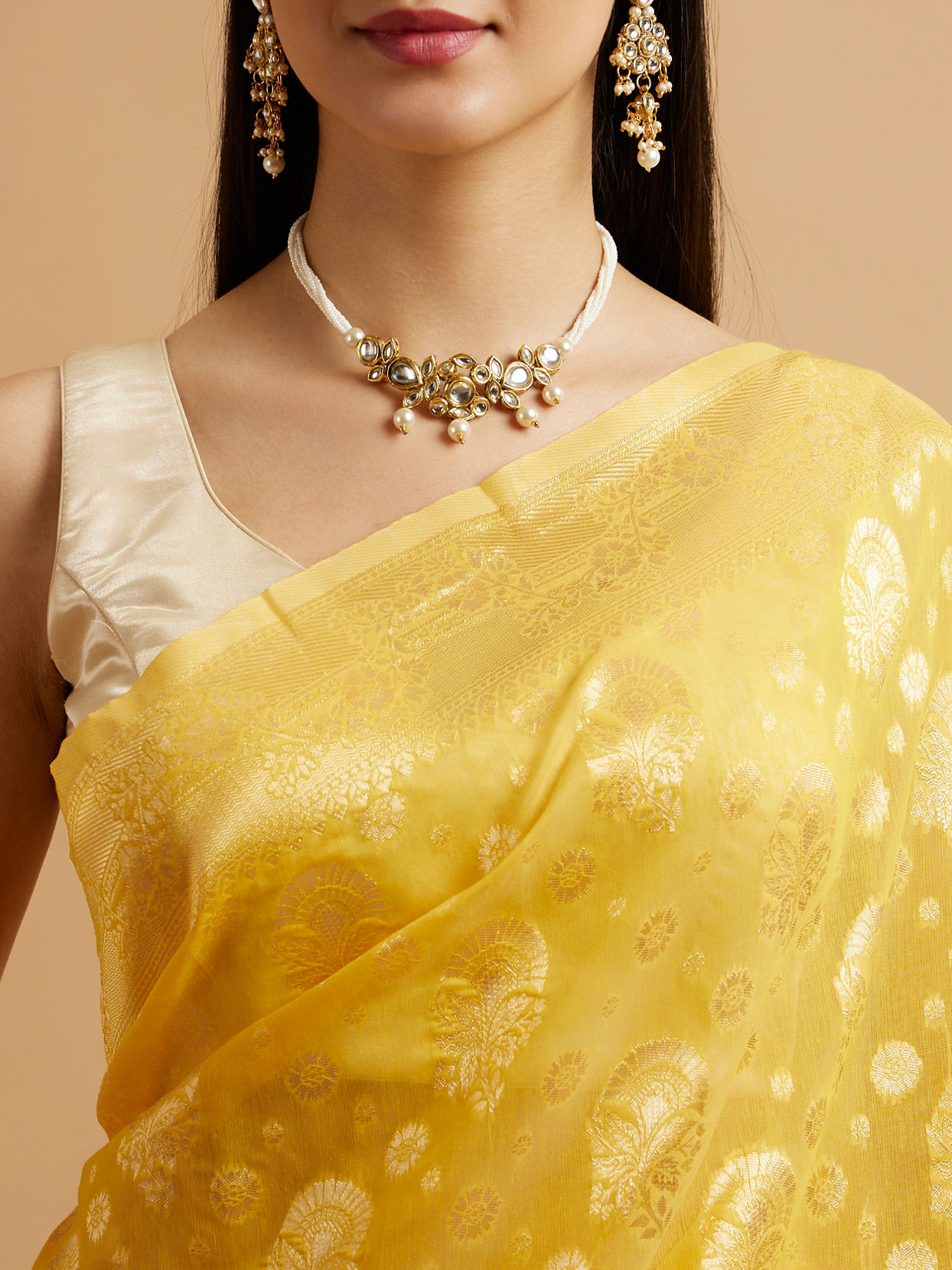 Mohey Women Radiant Yellow Zari Weave Saree