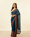 alt message - Mohey Women Teal Blue Stone Embellished Paisley Embroidered Saree image number 3