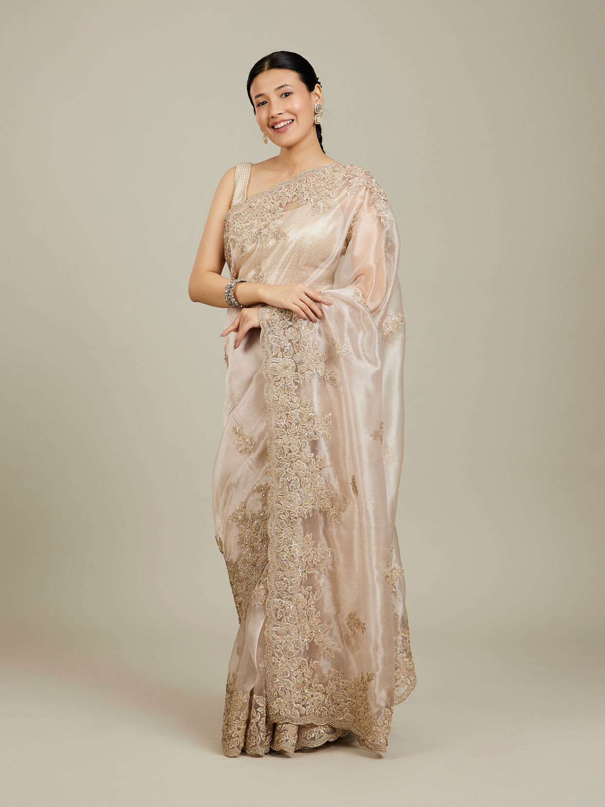 Mohey Women Ravishing Fawn Organza Saree