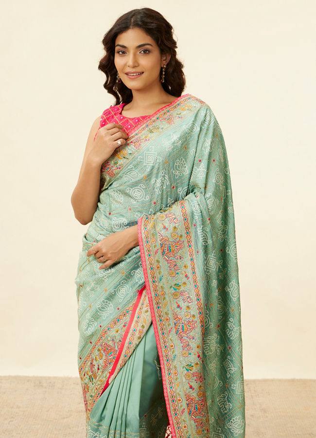 alt message - Mohey Women Sea Green Village Art Embroidered Saree image number 1