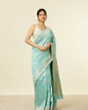 alt message - Mohey Women Light Blue Floral Zari Work Saree image number 0