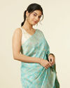 alt message - Mohey Women Light Blue Floral Zari Work Saree image number 1