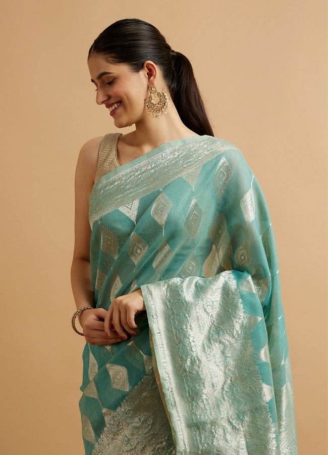 Mohey Women Light Blue with Intricate Zari Weave Saree