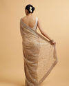 Mohey Women Beige Bel Buti Patterned Stone Embellished Saree