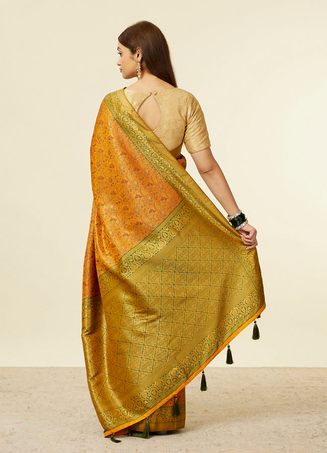 alt message - Mohey Women Mustard Yellow Bel Buti Patterned Saree with Trim Latkans image number 2