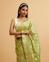 alt message - Mohey Women Light Green Floral Jaal Patterned Saree image number 1