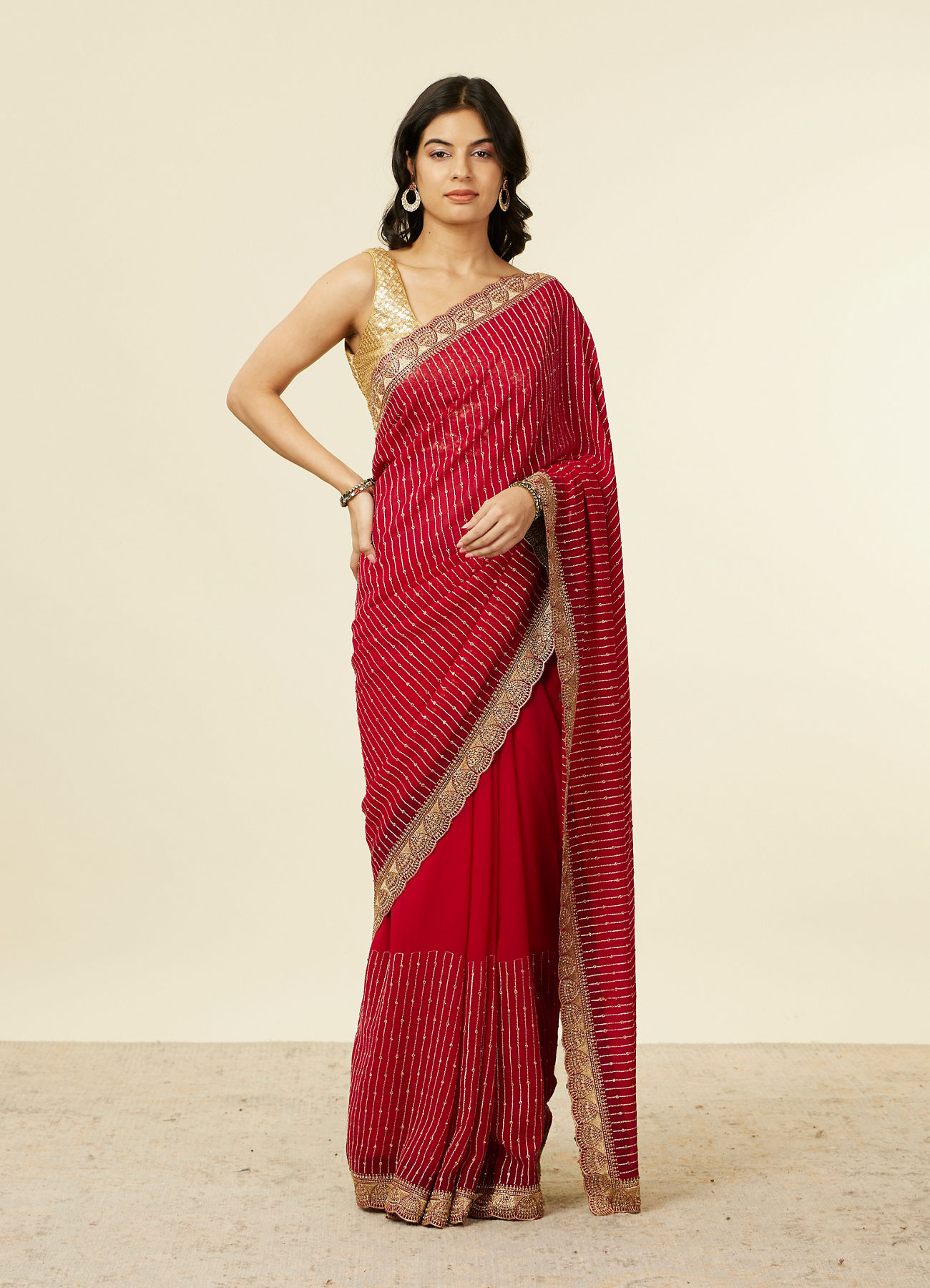 Mohey Women Royal Red Self Striped Saree with Gota Patti Border