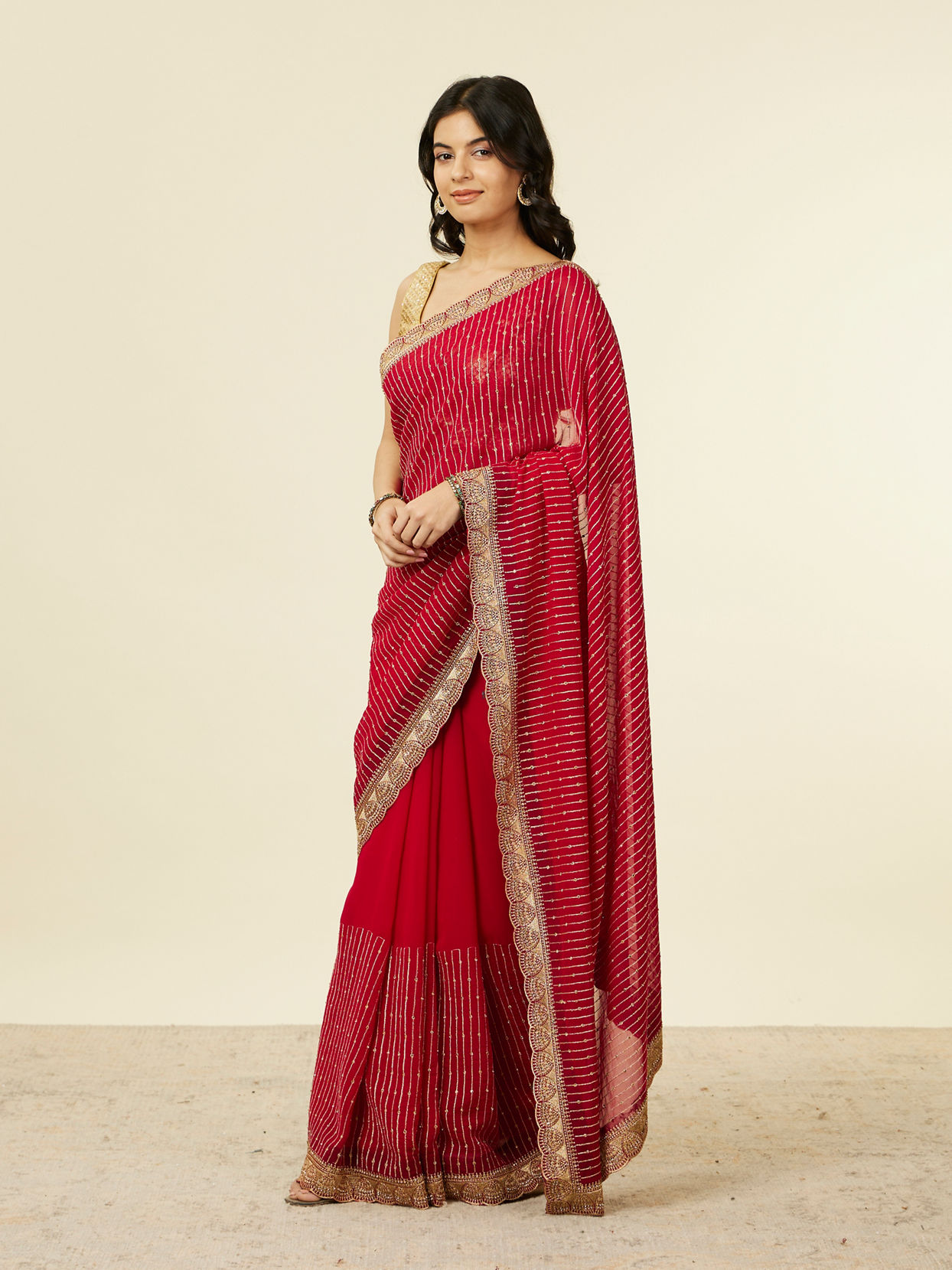 Mohey Women Royal Red Self Striped Saree with Gota Patti Border