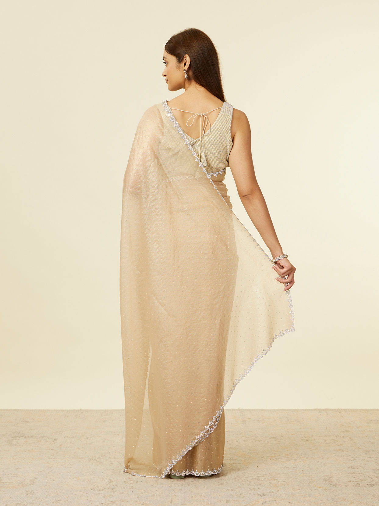 Mohey Women Classic Fawn Stone Embellished Saree