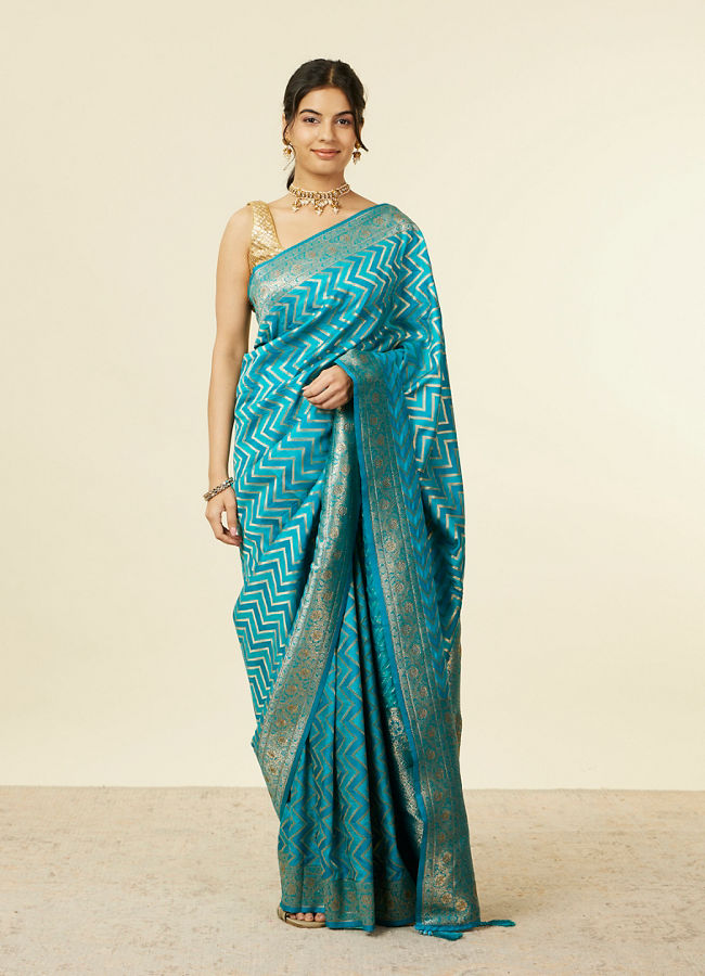 alt message - Mohey Women Teal Blue Chevron Patterned Saree image number 0