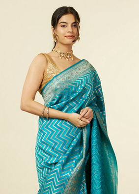 alt message - Mohey Women Teal Blue Chevron Patterned Saree image number 1