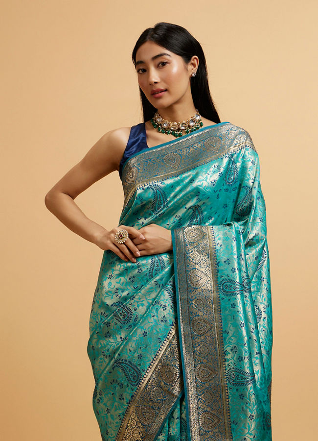 alt message - Mohey Women Teal Blue Paisley Patterned Saree with Rhinestones image number 0