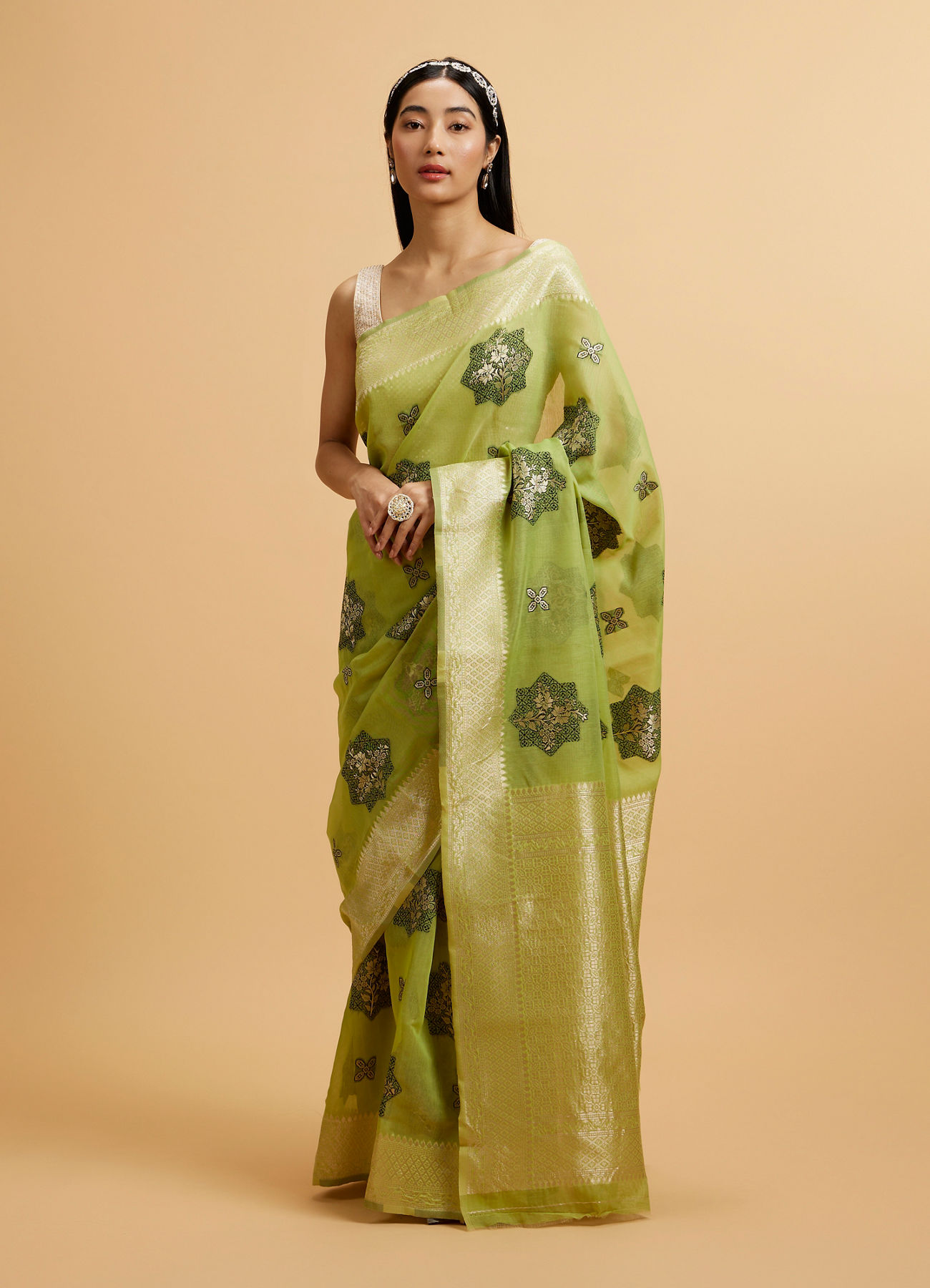 Mohey Women Pista Green Floral Motifs in Zari Work Saree