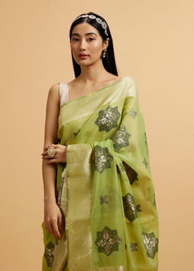 alt message - Mohey Women Pista Green Floral Motifs in Zari Work Saree image number 1