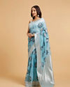 Mohey Women Turquoise Blue Floral Motifs in Zari Work Saree