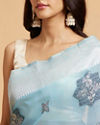 Mohey Women Turquoise Blue Floral Motifs in Zari Work Saree