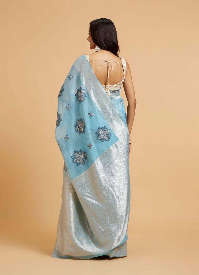 Mohey Women Turquoise Blue Floral Motifs in Zari Work Saree