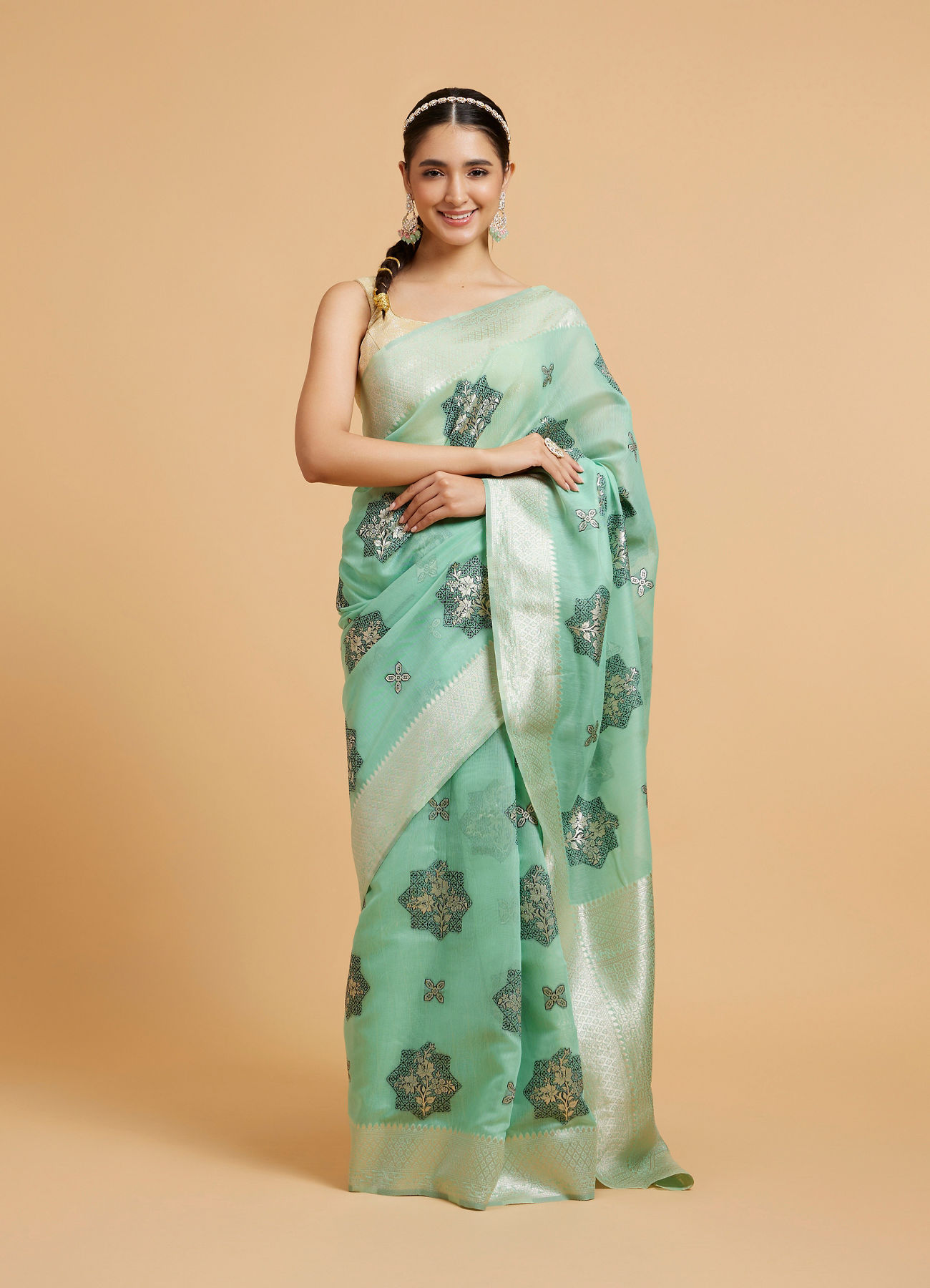 Mohey Women Sea Green Floral Motifs in Zari Work Saree