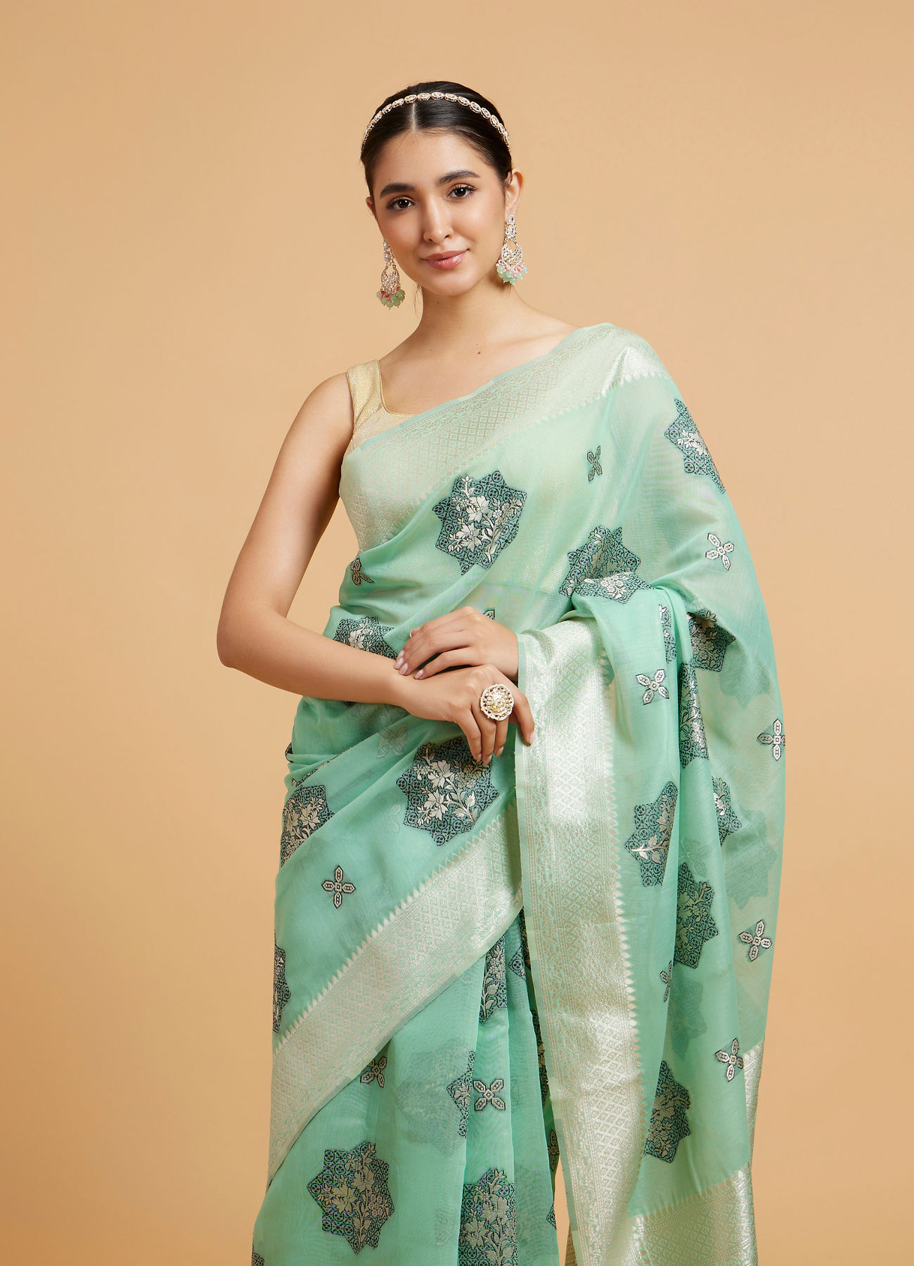 Mohey Women Sea Green Floral Motifs in Zari Work Saree