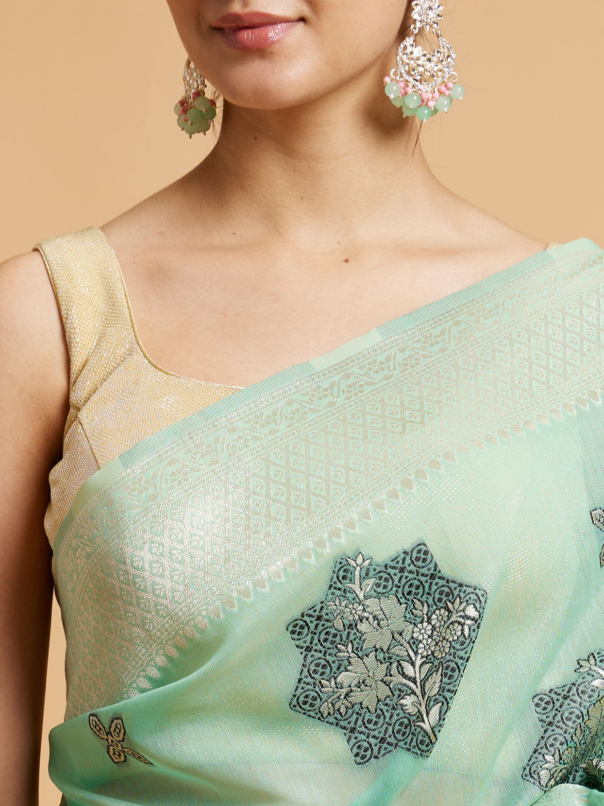 Mohey Women Sea Green Floral Motifs in Zari Work Saree