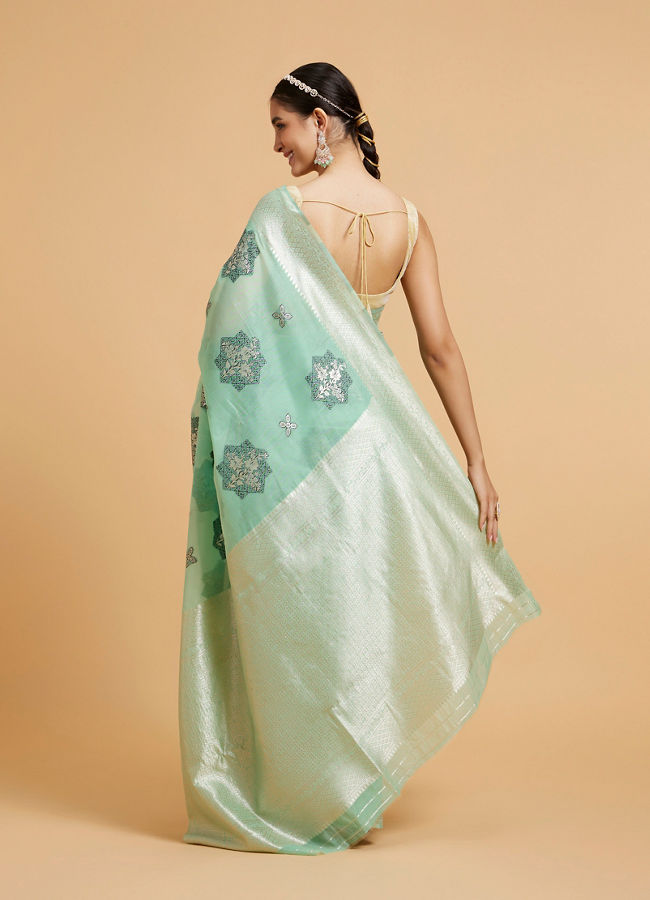Mohey Women Sea Green Floral Motifs in Zari Work Saree