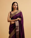 alt message - Mohey Women Wine Linear Patterned Rhinestone Saree image number 1