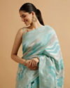 alt message - Mohey Women Light Blue Leaf Patterned Saree with Floral Motifs image number 1