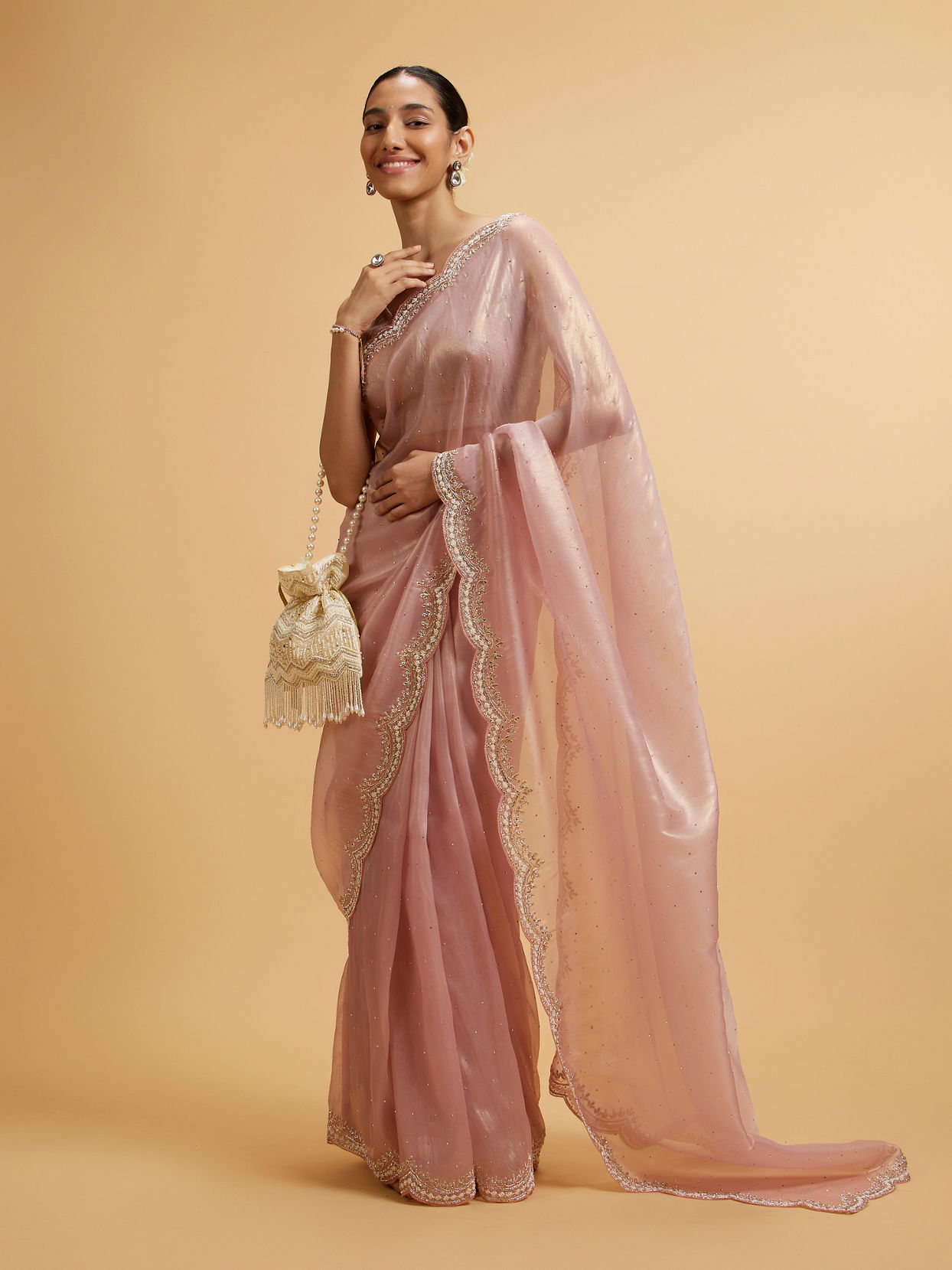 alt message - Mohey Women Light Pink Pearl and Rhinestone Embellished Saree image number 2