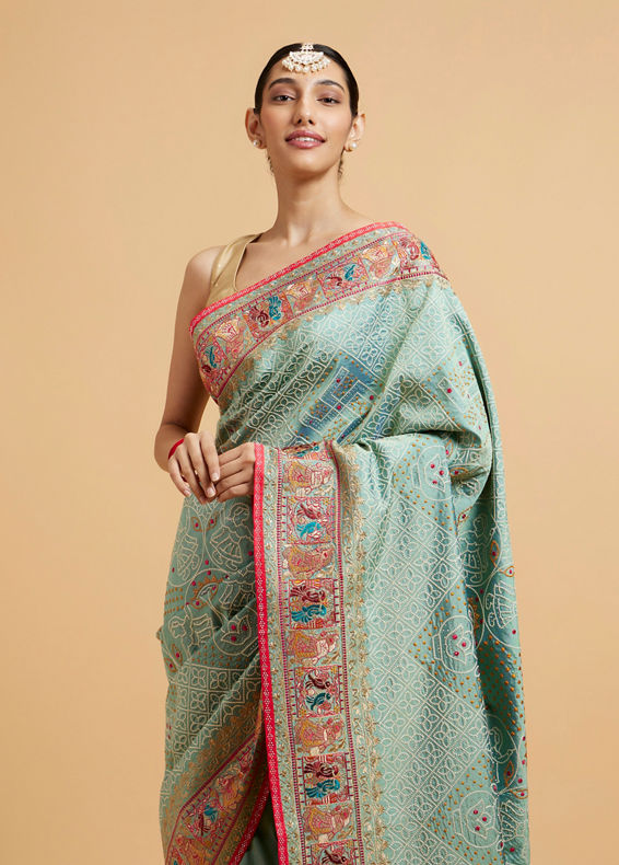 Mohey Women Sea Green Jaal Patterned Saree with Courtly Motifs