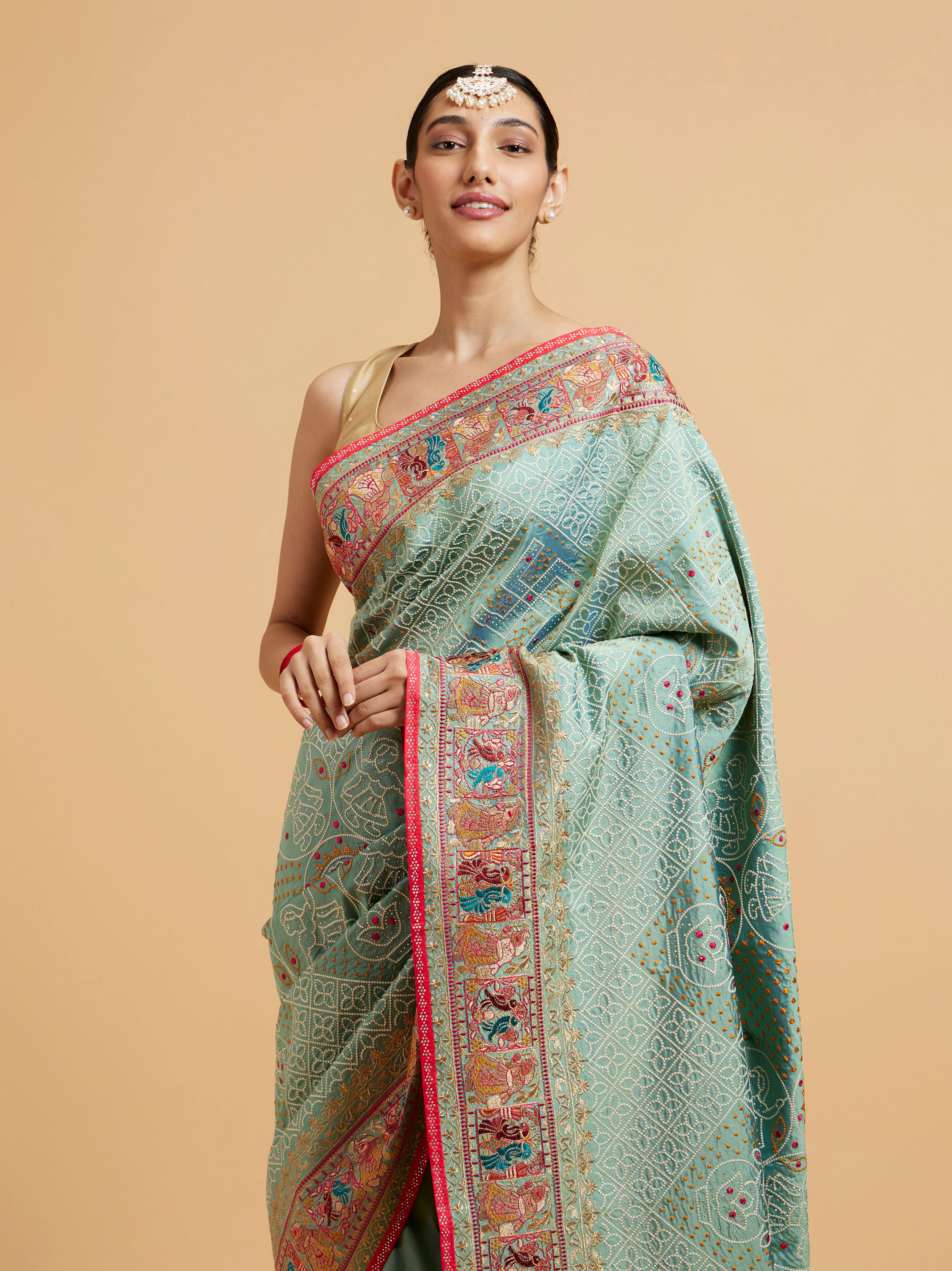 Mohey Women Sea Green Jaal Patterned Saree with Courtly Motifs